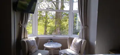 a window in a room with a sink and a table at Link House in Bassenthwaite Lake