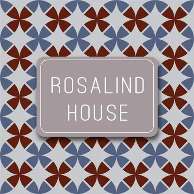 a white board with the words radial house on a mosaic pattern at Rosalind House in Carlisle