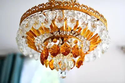 a chandelier with a gold at Welch House in Douglas