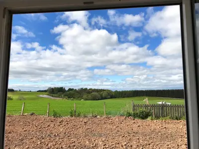 a view of a field from a window at No 1 Ramageton at Carnell Estates in Hurlford