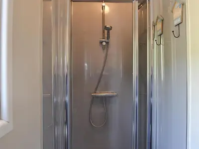 a shower in a bathroom with a shower at The Rocking Lodge in Threlkeld