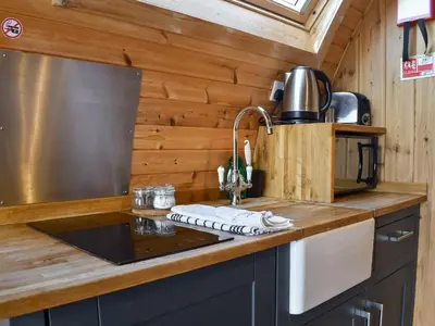 a kitchen with a sink in a tiny house at Barn Scar-Uk1394 in Corney