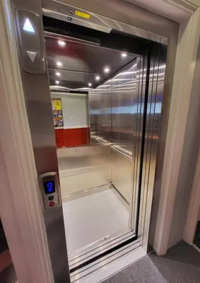 a glass door of a refrigerator in a room at At Caledonia in Douglas