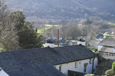 a group of roofs of houses in a village at End Cottage, Chapel Stile in Chapel Stile
