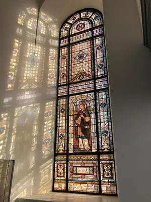 a large stained glass window in a church at East Church House, Unique 9 bedroom Church, Historic Market Town. in Strathaven