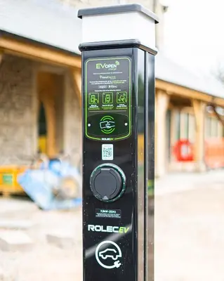 a black parking meter in front of a house at The Fleece at Ruleholme in Carlisle