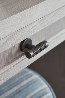 a close up of a wooden door with a handle at Little Nut Cottage in Ambleside