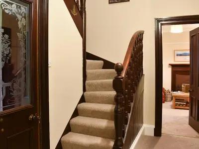 a stairway leading to aoyer with a stair case at Ingleside in Whiting Bay