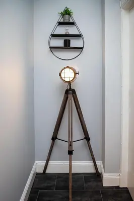 a tripod with a light on it in a room at St Andrews Guest House in Irvine