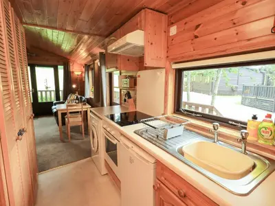 a kitchen with a sink and a counter top at Squirrels Leap in Keswick