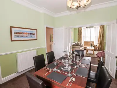 a dining room with a table and chairs at Oakhurst in Keswick
