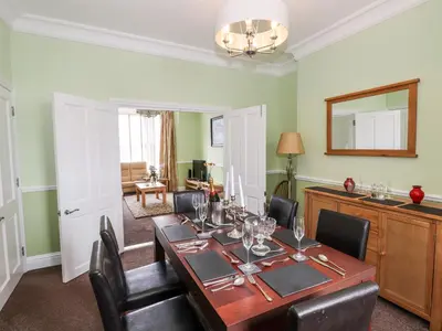 a dining room with a table and chairs at Oakhurst in Keswick