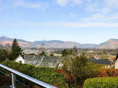 a view of the mountains from the balcony of a house at Cloud End in Keswick
