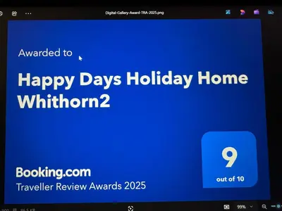 a phone screen with a happy days holiday home website at Happy Days Holiday Home Whithorn2 in Newton Stewart