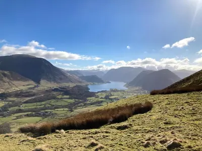 a view of a valley with a lake and mountains at Penny End, Mosser - Western Lakes and great walks in Cockermouth