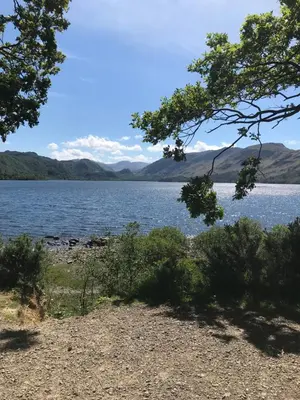a view of a lake with mountains in the background at The Nook at Claremont House CA12 4LT in Keswick