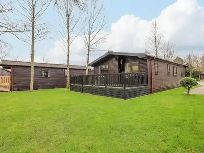 a house with a large yard in front of it at The Fold in Keswick