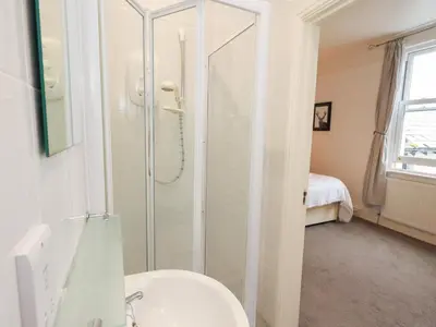 a bathroom with a shower and a sink at Hazelmere in Keswick