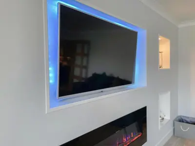 a large flat screen tv hanging on a wall at 4 Mote View-Uk37497 in Sandhead