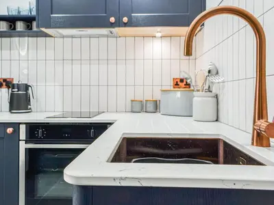 a kitchen with a sink and aaucet at The Old Stable in Keswick