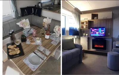 a living room with a couch and a table and a tv at AJL Caravan Rentals in Turnberry