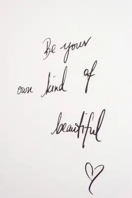a handwritten lettering inscription be your own kind of beautiful with a heart at Dumfries Apartment in Dumfries