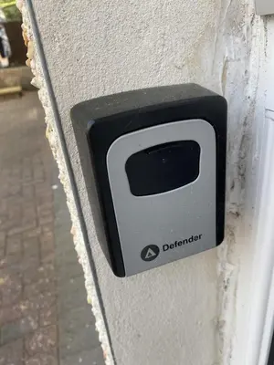 a black and white appliance on the side of a wall at The Dwelling Place in Irvine