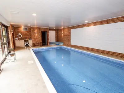 a large swimming pool in a house at Dale View in Cockermouth
