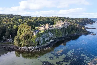 an island in the water with a castle on it at Garden House - Culzean Castle in Maybole