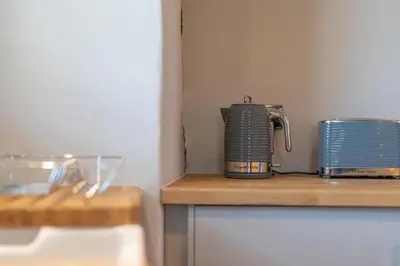 a coffeemaker sitting on top of a counter at Rose Cottage, Eden Valley, Cumbria in Cumwhitton