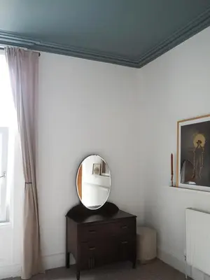 a mirror on top of a dresser in a room at Coorie Away - Kirkcudbright in Kirkcudbright