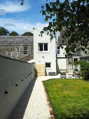 a view of a house from the backyard at Coorie Away - Kirkcudbright in Kirkcudbright