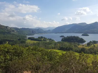 a view of a lake with mountains in the background at Dorchester House in Keswick