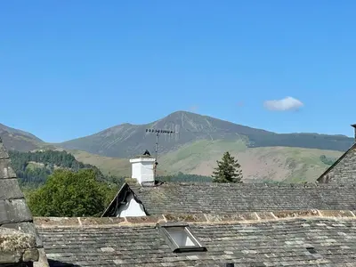 a view of a roof with mountains in the background at Grisedale Pike in Keswick