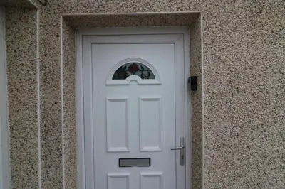 a white door with a window in a building at Signature - Kirkhill Middle in Kirkmuirhill