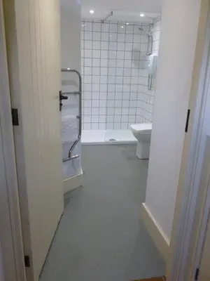 a bathroom with a toilet and a sink at The Old Map Shop in Wigton
