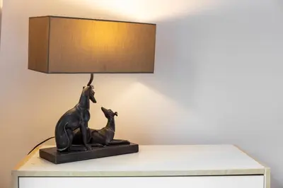 a lamp on a table with a lion and a giraffe at No27 The Barclay - Donnini Apartments in Kilmarnock