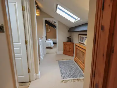 a hallway with a skylight in a house at Peak View in Keswick