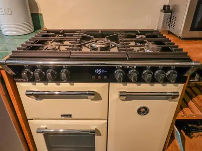 a stove top oven sitting in a kitchen at Fir Tree Cottage in Ambleside
