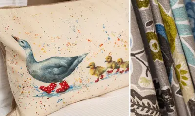 a pillow with a duck and three chicks on it at Scots Pine in Keswick