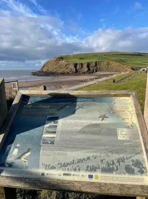 a large map on the side of a beach at Normsy Place Seaside Serenity Breath Taking Views in St Bees