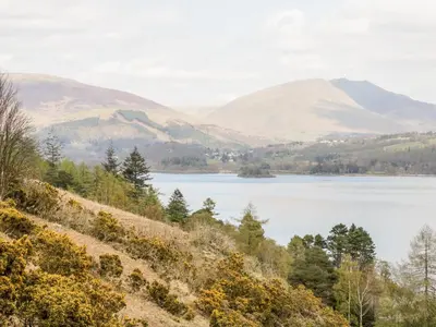 a view of a lake with mountains in the background at Apartment 1 Latrigg in Keswick