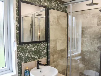 a bathroom with a sink and a shower at Dodd - Uk42499 in Bassenthwaite