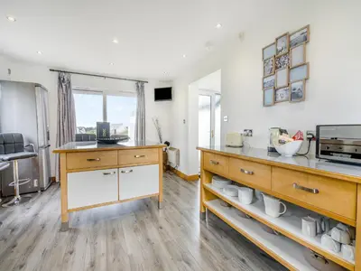 a kitchen with a counter and a counter top at Ben Ma Cree in Portpatrick