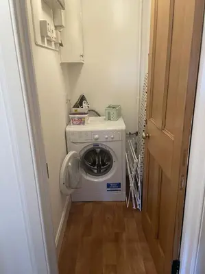 a washer and dryer in a small room at Popsal in Kirkcowan