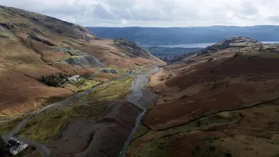 an aerial view of a river on a mountain at Fellside Cottage Coppermines Valley in Coniston