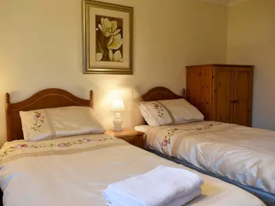 two beds sitting next to each other in a bedroom at Brow Riding in Keswick