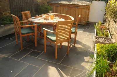 a table and chairs sitting on a patio at Serendipity in Kirkcudbright
